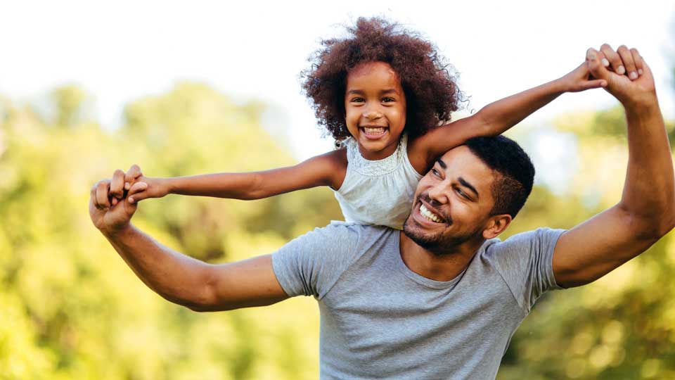 dad-carrying-daughter-istockW